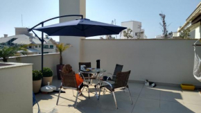 Отель Cobertura Conforto na Praia  Флорианополис